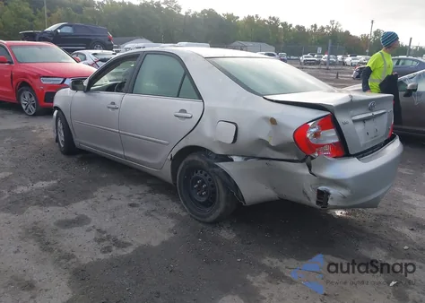2003 Toyota Camry Le z USA, uszkodzony, nr VIN 4T1BF32K23U043478